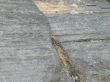 a dark grey rock close up background
