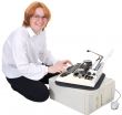 Girl printing on an typewriter
