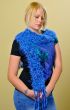 Frontal shot of blonde woman posing with scarf