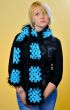Frontal shot of blonde woman posing with scarf