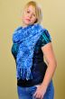 Frontal shot of blonde woman posing with scarf