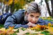 Lying on maple leaves