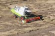 Machine harvesting the corn field