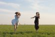 two girls running on the field 2