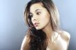 Young Woman on blue background