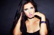 beautiful and sexy brunette girl on dark