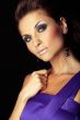 beautiful and sexy brunette fashion girl in violet dress