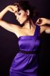 beautiful and sexy brunette fashion girl in violet dress