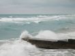 stormy tropical ocean crashing on the coast
