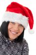 Young woman wearing Santa hat