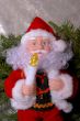 Christmas Santa Claus puppet with a candle