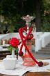 Hookah and red rose in vase