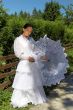 beautiful young woman, in a white dress with umbrella