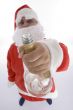 santa clause showing wine bottle