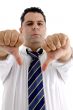 serious businessman showing thumb down gesture