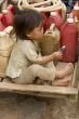 Child with gasoline can