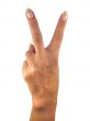 Human lady hand showing two fingers isolated over white background