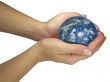 Human lady hands holding earth globe isolated over white