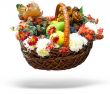 Wicker basket Autumn harvesting vegetables, fruits, leaves and flowers isolated over white background with shadow