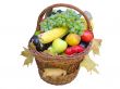 Wicker basket with autumn fruit and vegetables isolated over white background
