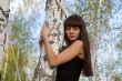 girl hugging birch 2