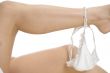 woman taking off her underwear