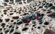 Sun glasses on the honeycomb stone surface