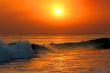 Surfers with Sunset