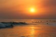 Surfers at Sunset
