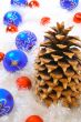 Pine Cone with Red & Blue Ornaments