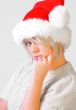 Blonde Woman with a Santa`s Hat
