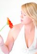 Blond woman with an Orange Flower