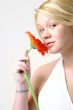 Blond Woman with an Orange Flower