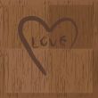 Love and heart on wood