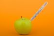 Apple with thermometer