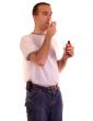 Man Swallowing Medicine