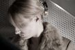 Portrait of a depressed blond girl