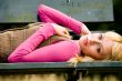 On my back on a bench