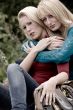 Hugging sisters