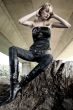 Paris Hilton look-a-like fashion shoot on a tree stump