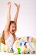 Young child is stretching