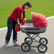 Woman with baby carriage