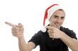 pointing man with christmas hat