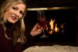Drinking wine by the fire