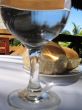 bread and water on a restaurant table
