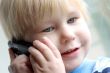 child speaks on the telephone