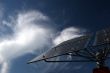Solar panels in front of bizarre cirrus clouds