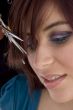 beautiful female taking haircut
