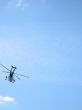 helicopter in the blue sky