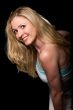 Blond woman on black